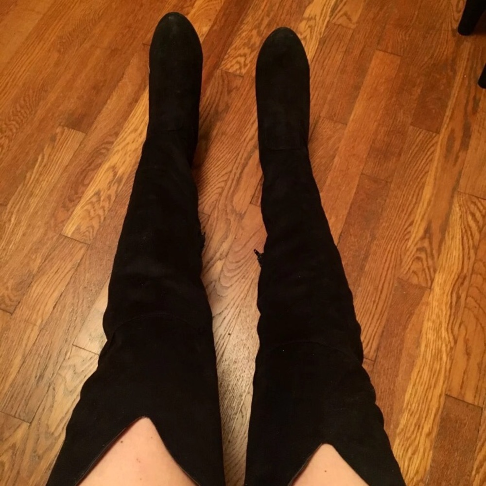 Thigh high black boots